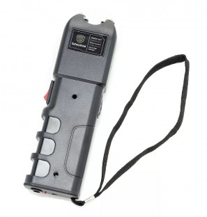 This powerful stun gun is 6.5 inches long, features grab guard stun strips, a bright LED flashlight, rubberized armor coating, safety switch, and is rechargeable.